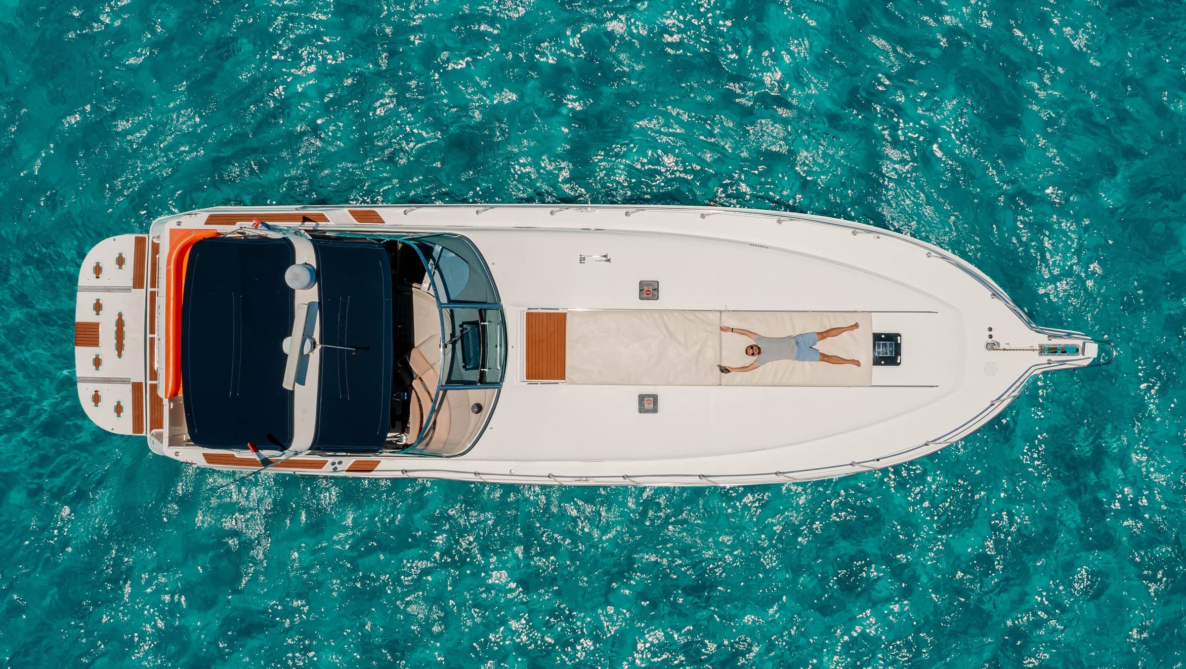 Aerial view of the yacht, with the bow deck and sunbathing area.