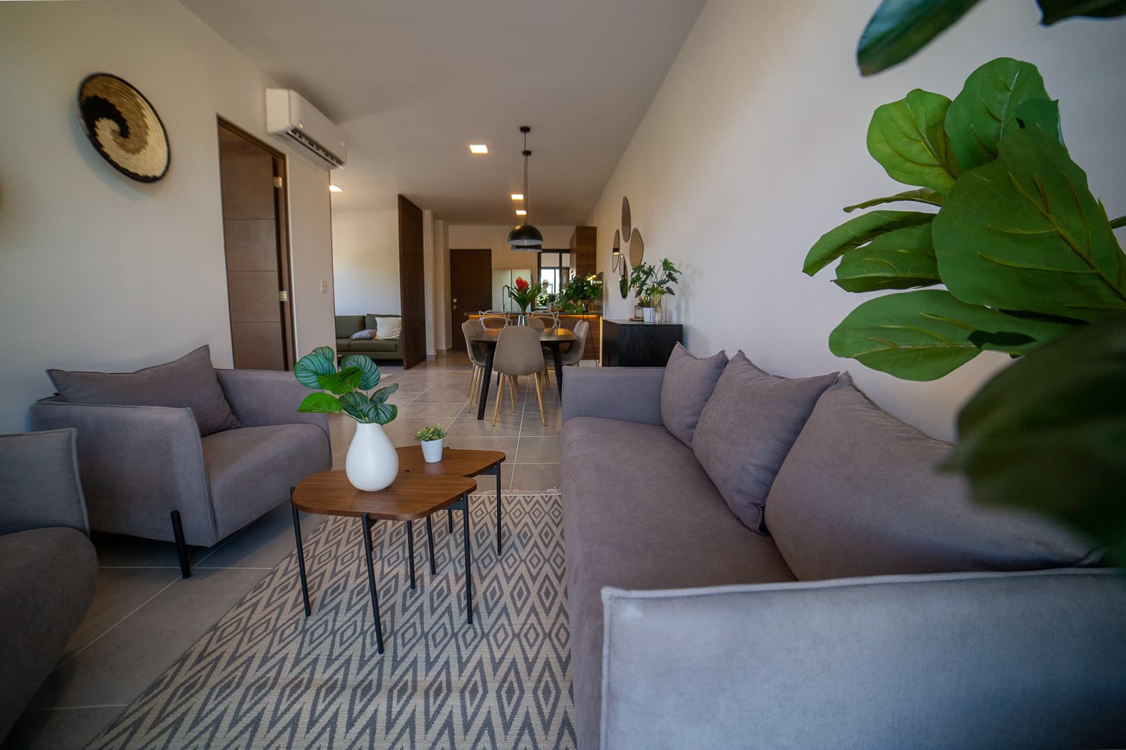 Open stay: foreground living room and dining room behind.
